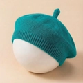 Close-up of baby knitted beret in blue with ribbed brim and soft wool texture detail - Royal Blue
