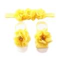 Detail of yellow chiffon flower headband and matching barefoot sandals for infants - Yellow