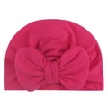 Detailed view of pink knitted baby turban hat with a large soft decorative bow - Rose Red