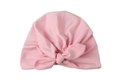 Detailed close-up of soft pink baby knot hat featuring an elastic cotton bow design - Pink