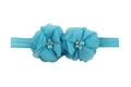 Détail du bandeau fleur en mousseline bleu clair avec perles et strass pour enfants - Bleu
