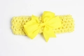 Diadema elástica para bebé con un lazo amarillo brillante para fotos de recién nacidos - Amarillo