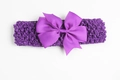 Diadema de ganchillo morada para bebé con un lazo grande acanalado para niñas - Morado