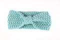 Close-up of the chunky knit texture and central twist knot of the mint green baby headband - Mint Green