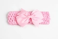 Pink crocheted baby headband with a large ribbed bow detail for children hair accessories - Pink
