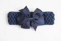 Elastic baby headband with wide dark blue crochet band and a large ribbed ribbon bow - Navy Blue