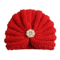 Detailed view of red knitted baby hat featuring pearl flower and rhinestone accents - Adjustable / Red