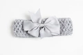 Infant silver grey headband featuring an elastic crochet band and large grosgrain ribbon bow - Gray