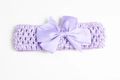 Purple elastic baby headband with large ribbed ribbon bow in a solid knit style - Lavender