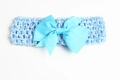 Light blue newborn elastic headband with large ribbed bow detail for infants - Light Blue