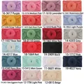 Détail de 23 bandeaux pour bébé en nylon souple avec nœuds donuts en matrice de couleurs - Couleurs Mixtes