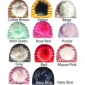 Grid view showing eleven colors of knit baby hats with fluffy faux fur pom-poms - One Size / 11 Colors Assorted