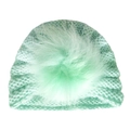 Close-up of mint green winter knit baby hat with a matching soft faux fur pompom ball - One Size / Mint Green