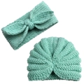 Dettaglio della trama in maglia del set fascia neonato e berretto a pieghe verde menta - Taglia unica / Blu