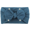 Close-up of soft lake blue nylon baby headband with large bow and white pearls details - Navy Blue