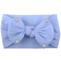 Detail of light blue baby headband featuring a large bow and decorative white pearls - Light Purple