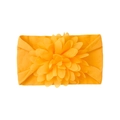 Detailed close-up of a vibrant orange baby nylon headband with a large layered chiffon flower - Earthy Yellow