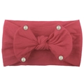 Detail of rose red nylon headband with large soft bow and shiny pearl accents - Red