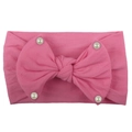 Detail of pink soft nylon baby headband with a large bow and four white pearl accents - Rose Red