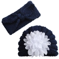 Detail of navy knit baby hat with white floral applique and matching bow headband set - Navy