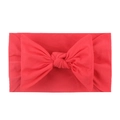 Soft nylon infant headband featuring a large vibrant red bow for baby girls - Red