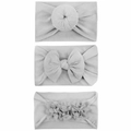 Detailed view of three light grey soft nylon baby headbands with bow and floral accents - Gray