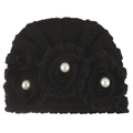 Detailed view of black knitted baby hat with handmade fabric flowers and white pearls - One Size / Black