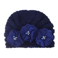 Detail of navy knit baby beanie featuring three chiffon flowers with pearls and rhinestones - One Size / Navy Blue