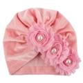 Detail of pink velvet baby turban hat featuring chiffon flowers and faux pearls - One Size / Pink