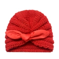 Red knit turban hat for babies featuring a large decorative bow and soft ribbed texture - Red
