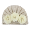 Detailed view of beige knit baby turban hat with three large silk flowers and pearls - One Size / Beige