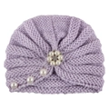 Close-up of light purple knitted baby hat with pearl and rhinestone flower detail - One Size / Purple