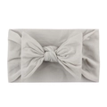 Soft cream white nylon headband for babies featuring a large knit texture bow decoration - Gray