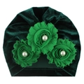 Detail of dark green velvet baby hat featuring three bright green flowers and white pearls - Dark Green
