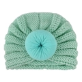 Detail view of mint green knit baby turban hat with a soft donut knot decoration - Mint Green