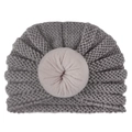 Detailed knit texture and pink donut-shaped knot on a soft grey infant beanie hat - Gray