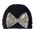 Detail of baby turban hat in navy knit with a large sparkling silver sequin bow - Navy Blue