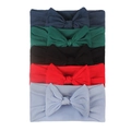 Dettaglio di set da 5 fasce per capelli neonato con grandi fiocchi in colori diversi - Navy Verde Nero Rosso Lilla (E)