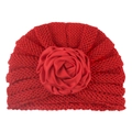 Bright red knitted baby turban hat featuring a large soft decorative fabric rose - Red