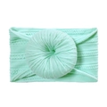 Close-up of soft mint green nylon baby headband with a donut knot on white background - Mint Green