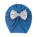 Detail of teal baby turban hat with a large sparkling silver sequined bow on front - Navy Blue