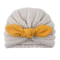 Beige baby knit hat with yellow oversized waffle bow for winter toddler warmth - Beige
