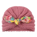 Infant knitted earflap beanie in dusty rose with a stylish floral print bow decoration - Dusky Pink