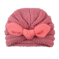 Pink knit baby turban hat featuring a large bow and warm corn grain texture for girls - Dusky Pink