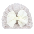 Detail of baby ribbed knit turban hat with large cream satin bow for autumn and winter - Off White