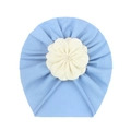 Close-up of soft light blue baby turban with a large 3D white fabric flower detail - Blue