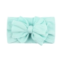 Diadema para bebé en color verde menta de nailon trenzado con un lazo grande - Verde Menta (13-5412)