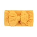 Bandeau bébé en nylon jacquard jaune gingembre avec un grand nœud en maille tressée - Earth Yellow (15-1049)