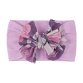 Détail du bandeau bébé avec nœud floral rose en tissu de nylon doux et extensible - Violet