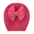 Detailed view of the rose pink waffle texture bow on a soft newborn turban hat - Rose Red